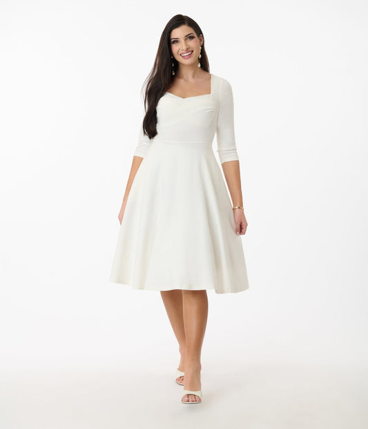 Unique Vintage 1950s Ivory Pleated Bust Swing Dress