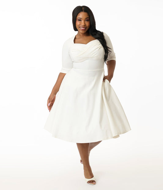 Unique Vintage Plus Size 1950s Ivory Pleated Bust Swing Dress